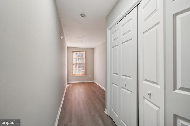 hall with light wood-type flooring