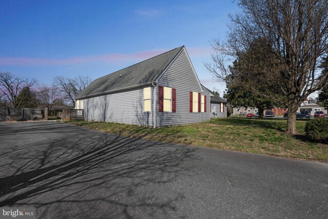 view of property exterior at dusk