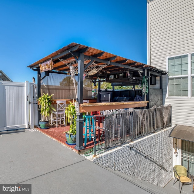 view of patio with a bar