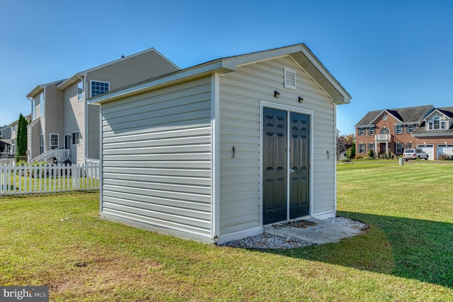 view of outdoor structure featuring a yard