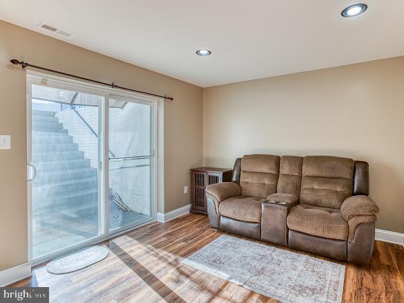 living room with hardwood / wood-style floors