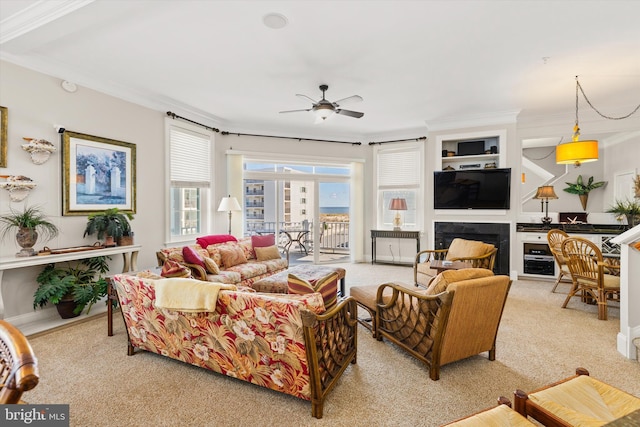 9 134th St Unit 9B, Ocean City, MD 21842 - living room with a fireplace, crown molding, light colored carpet, and a ceiling fan