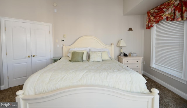 carpeted bedroom with a closet