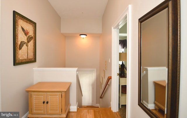 9 134th St Unit 9B, Ocean City, MD 21842 - corridor featuring wood finished floors and an upstairs landing