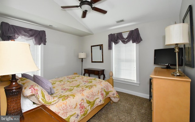 bedroom featuring ceiling fan, lofted ceiling, and dark carpet