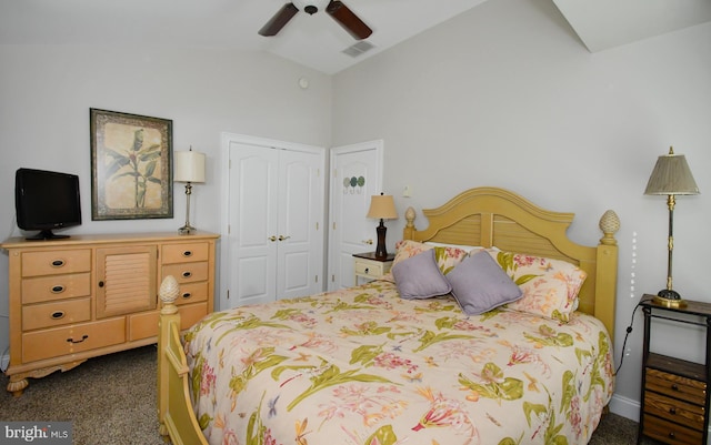 carpeted bedroom featuring vaulted ceiling, ceiling fan, and a closet