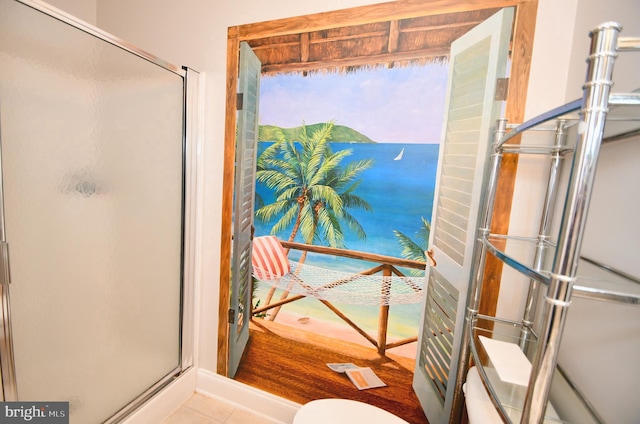 9 134th St Unit 9B, Ocean City, MD 21842 - full bathroom with tile patterned floors, toilet, and a stall shower