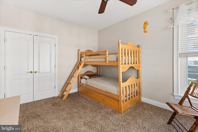 9 134th St Unit 9B, Ocean City, MD 21842 - bedroom with carpet floors, a closet, baseboards, and ceiling fan