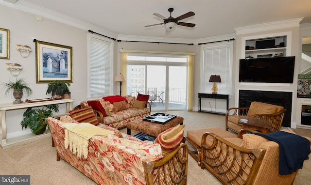 living room featuring light carpet, ornamental molding, and ceiling fan