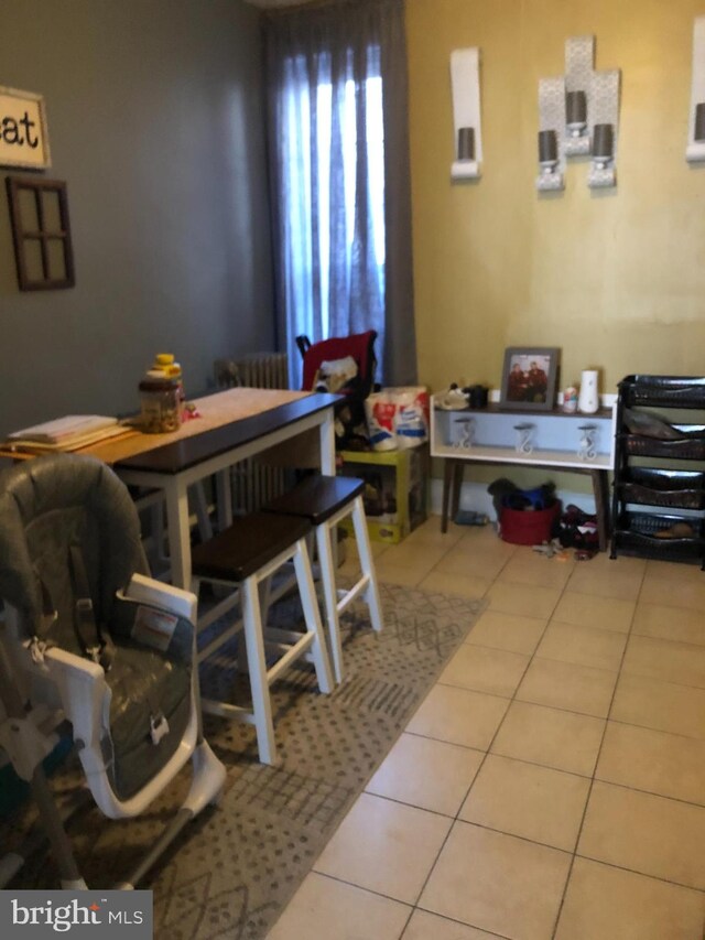 dining area featuring tile patterned floors