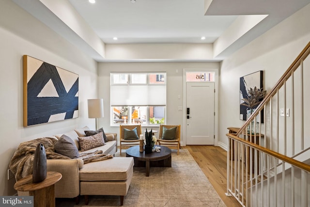 living room with light hardwood / wood-style flooring