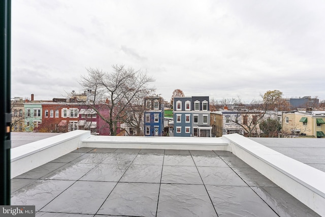 view of patio / terrace with a balcony