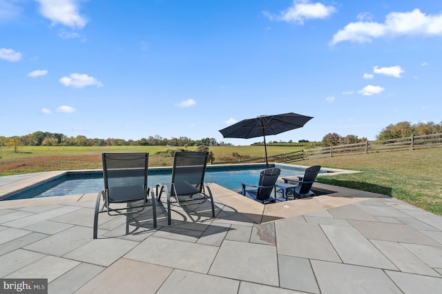 1484 W Strasburg Rd, West Chester, PA 19382 - pool featuring a lawn, a rural view, fence, and a patio