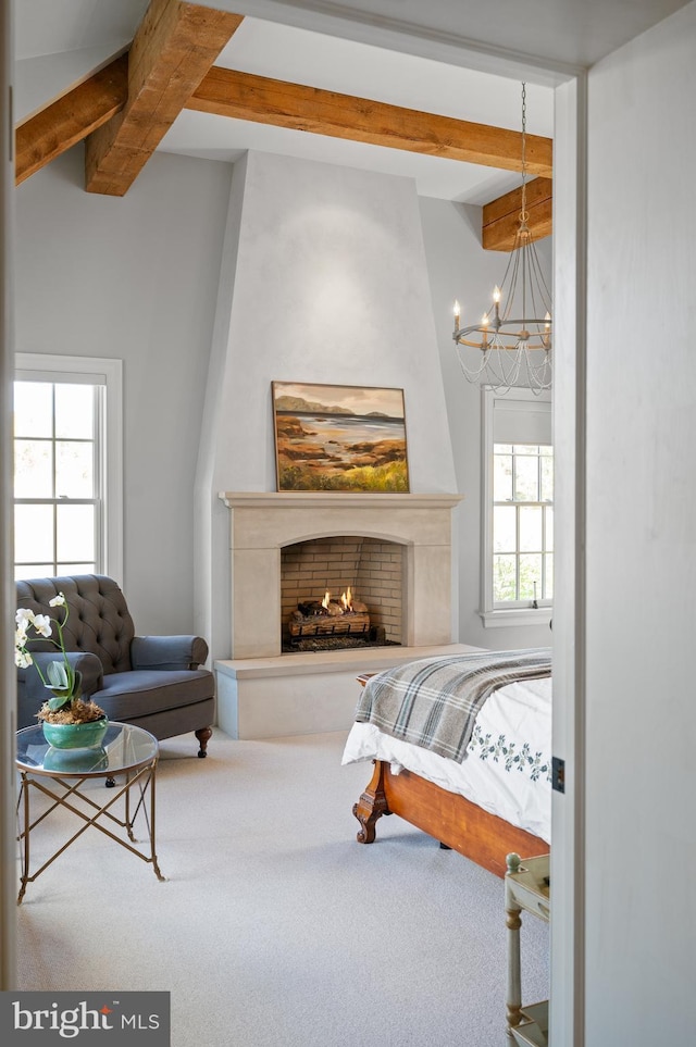 1484 W Strasburg Rd, West Chester, PA 19382 - bedroom with a warm lit fireplace, beamed ceiling, carpet flooring, and a chandelier