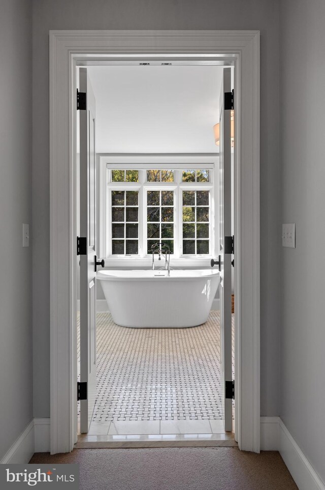 1484 W Strasburg Rd, West Chester, PA 19382 - bathroom with baseboards and a freestanding tub