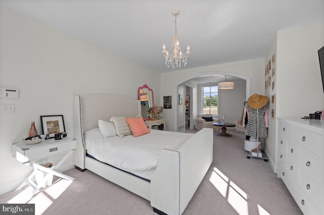 1484 W Strasburg Rd, West Chester, PA 19382 - bedroom with arched walkways, a chandelier, and light carpet