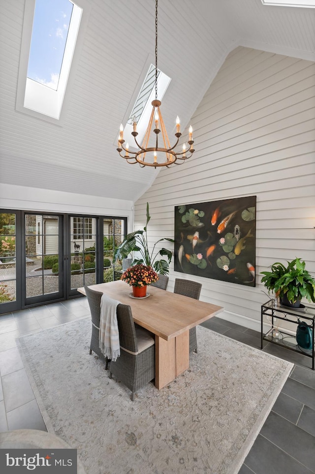 1484 W Strasburg Rd, West Chester, PA 19382 - dining area with tile patterned floors, a notable chandelier, high vaulted ceiling, and a skylight
