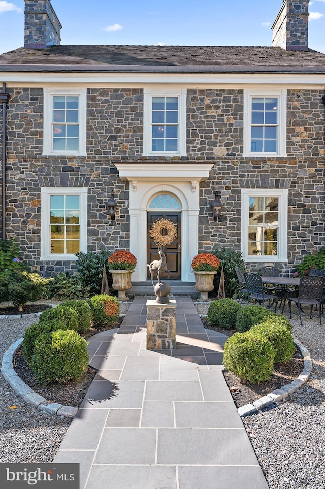 1484 W Strasburg Rd, West Chester, PA 19382 - entrance to property with stone siding and a chimney