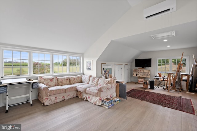1484 W Strasburg Rd, West Chester, PA 19382 - living room with attic access, a wall mounted air conditioner, vaulted ceiling, and wood finished floors