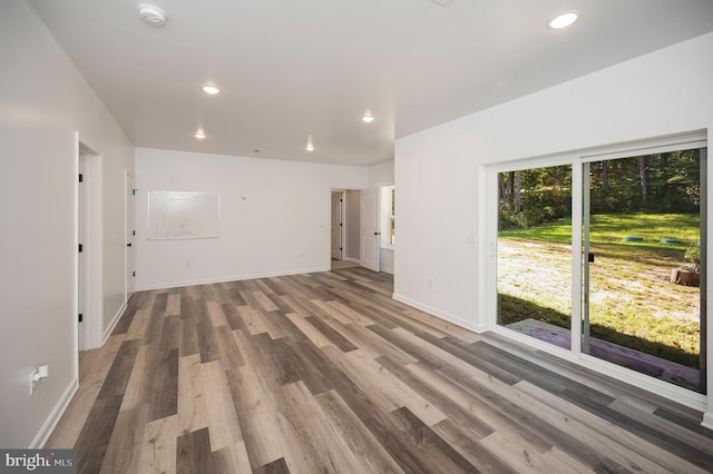 unfurnished room featuring hardwood / wood-style floors