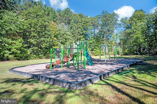 view of play area featuring a lawn