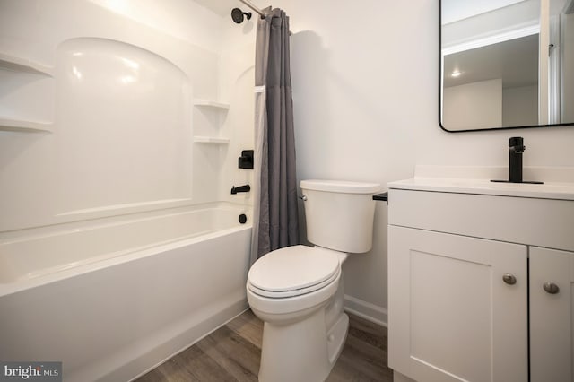 full bathroom with toilet, shower / tub combo, wood-type flooring, and vanity