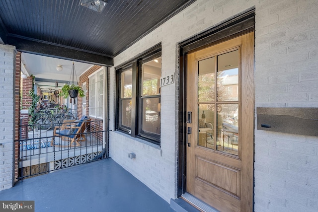 entrance to property with covered porch