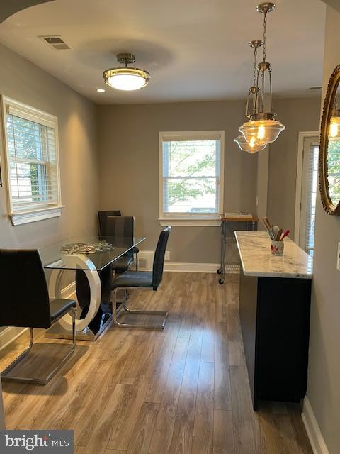 office area with hardwood / wood-style floors