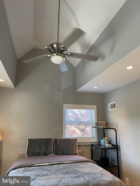 bedroom featuring lofted ceiling and ceiling fan