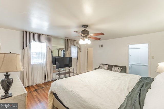 bedroom featuring ceiling fan and wood-type flooring