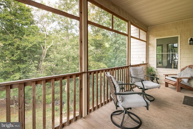 sunroom with wood ceiling