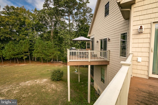 view of yard with a wooden deck