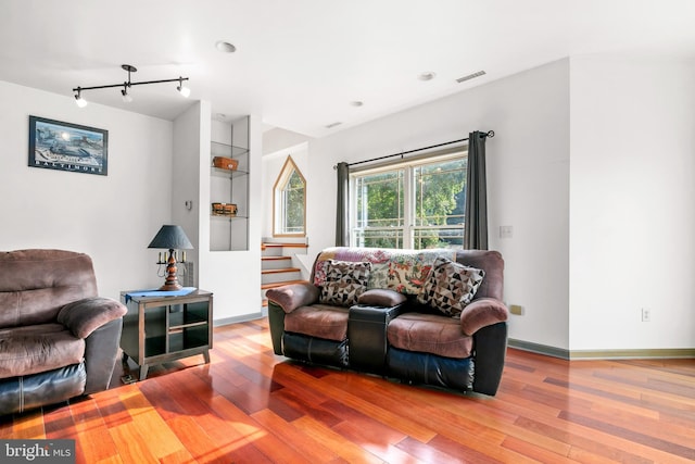 living room with hardwood / wood-style flooring