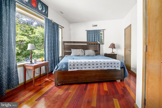 bedroom featuring dark hardwood / wood-style floors