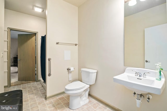 bathroom featuring toilet