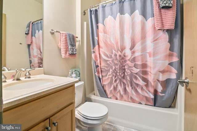 full bathroom featuring vanity, toilet, and shower / bathtub combination with curtain