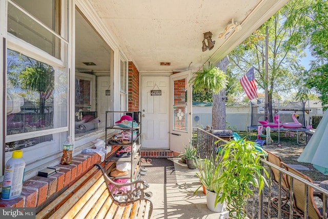 property entrance with a patio