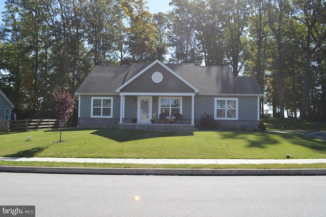 view of front of home with a front lawn