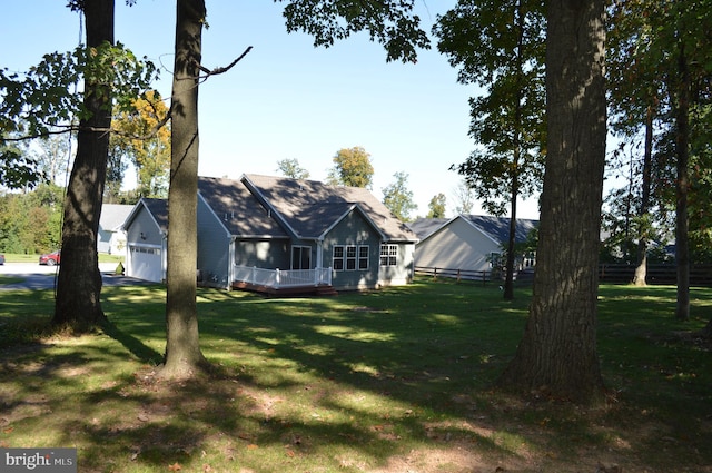 view of yard with a garage