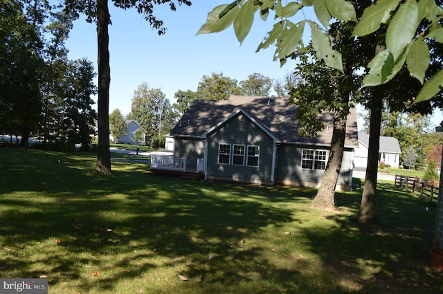 view of home's exterior featuring a yard