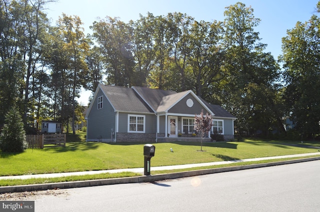 view of front of home featuring a front yard