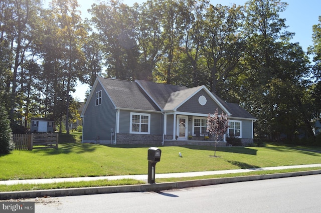 view of front facade featuring a front yard