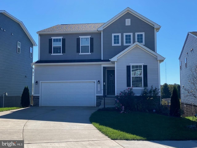 view of front property with a garage