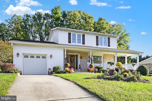 2123 Round Hill Rd, Fallston, MD 21047 - traditional home featuring an attached garage, a porch, and concrete driveway