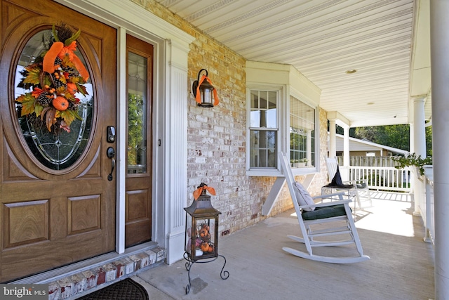 2123 Round Hill Rd, Fallston, MD 21047 - doorway to property featuring covered porch and stone siding