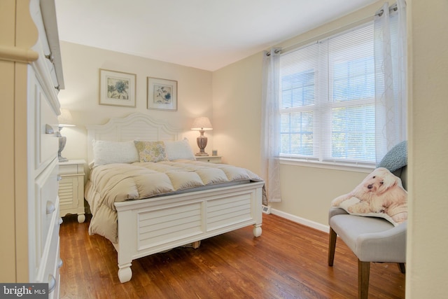 bedroom featuring hardwood / wood-style floors