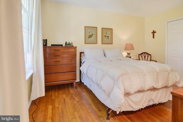 bedroom featuring hardwood / wood-style floors