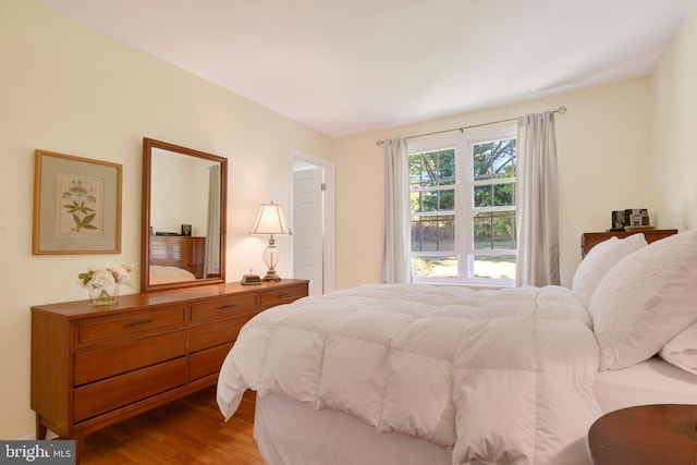 bedroom featuring hardwood / wood-style flooring