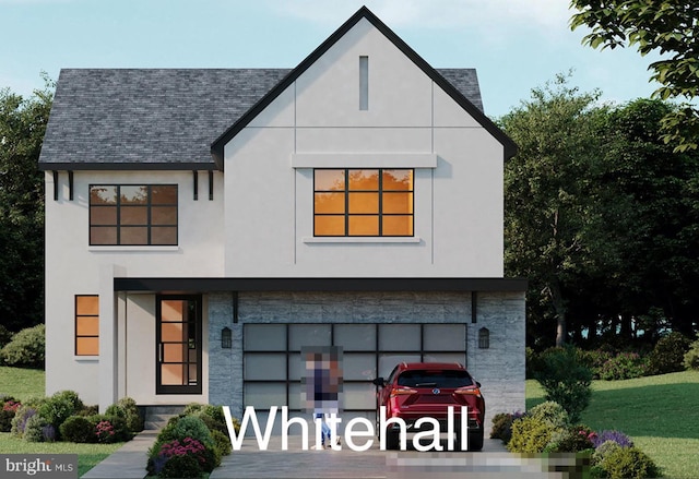 rear view of property featuring a garage and a yard