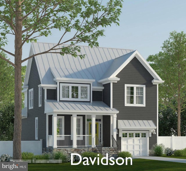 view of front facade featuring a garage and covered porch